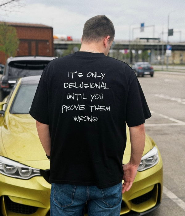 IT'S ONLY DELUSIONAL UNTIL YOU PROVE THEM WRONG  - Oversized T-shirt  [ Unisex ]