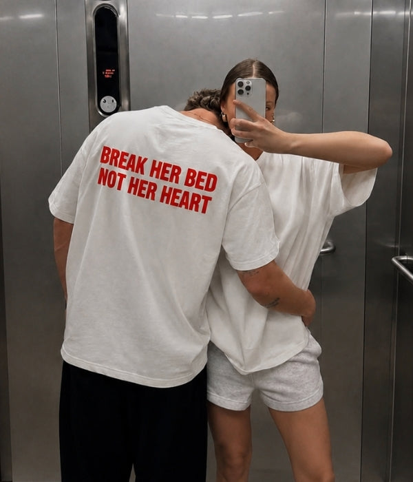 BREAK HER BED NOT HER HEART - Oversized T-shirt  [ Unisex ]