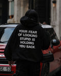 YOUR FEAR OF LOOKING STUPID IS HOLDING YOU BACK - Women Oversized Hoodie