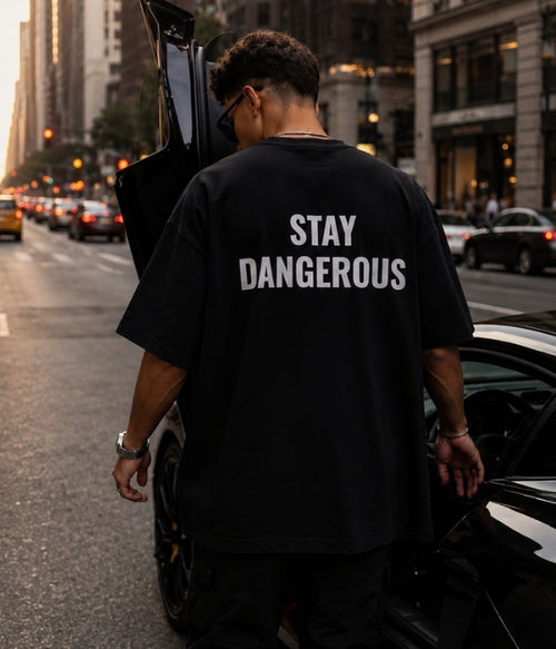 STAY DANGEROUS  - Oversized T-shirt  [ Unisex ]