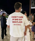 I DON'T CARE IF SHE GOT RED FLAGS  - Oversized T-shirt  [ Unisex ]