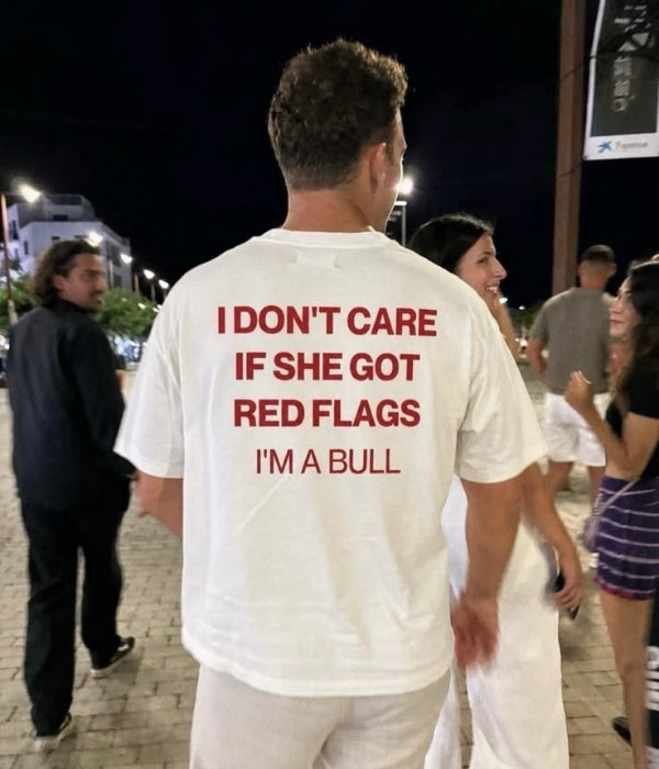 I DON'T CARE IF SHE GOT RED FLAGS  - Oversized T-shirt  [ Unisex ]